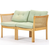 2 SEATER SOFA AND 2 MATCHING ARMCHAIRS MADE OF BEECH WOOD  AND WICKER.  Illum Wikkelsø for C.F.C.  model 'Plexus'