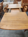 Teak dining table