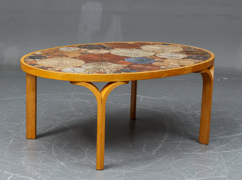 Haslev furniture. Oval coffee table with tiles.