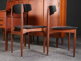 2 Danish teak chairs with black leatherette.