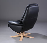 Anderssons. Easy chair with accompanying stool, black leather.