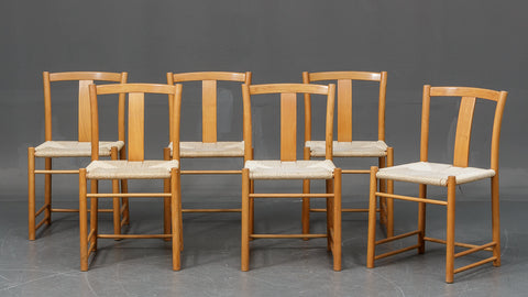 Italian furniture design. Six chairs in beech with wicker