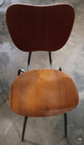 Brown chairs with mettle bottom