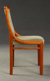 Set of four dining chairs, cherry, from Lübke Germany.