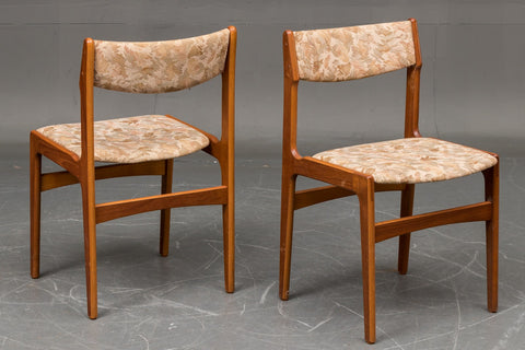 Six teak chairs
