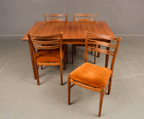 Teak Dining Table with Dutch Leaves