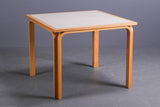 Square beech wood table by Rud Thygesen & Johnny Sørensen.