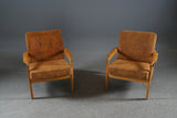 A pair of white European oak armchairs. Probably Erik Chambert