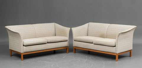 Two Arne Norell, seater sofas.