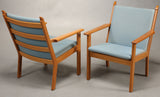 Two Oak Armchairs with Baby Blue Wool Upholstery by Hans J. Wegner