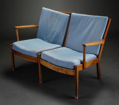Danish furniture manufacturer. Freestanding 2 seater sofa.