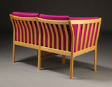 Back Side of Beech Loveseat with Hot Pink Wool Upholstery