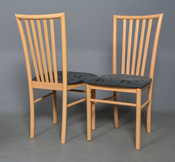 Front and Back of Beech Dining Chairs with Black Patterned Seat and Wood Backs