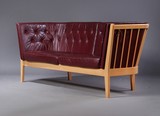 The Maria. Burgundy Leather Sofa with Beech Frame by Wojtek Depka Carstens