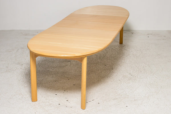 Skovby. Dining table of solid lacquered beech with three extention Leaves.