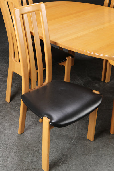 Beechwood dining room chairs with black leather seats