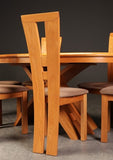 Sculptural solid cherry dining chairs