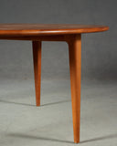 Sideview of Round Solid Teak Coffee Table by A. Mikael Laursen