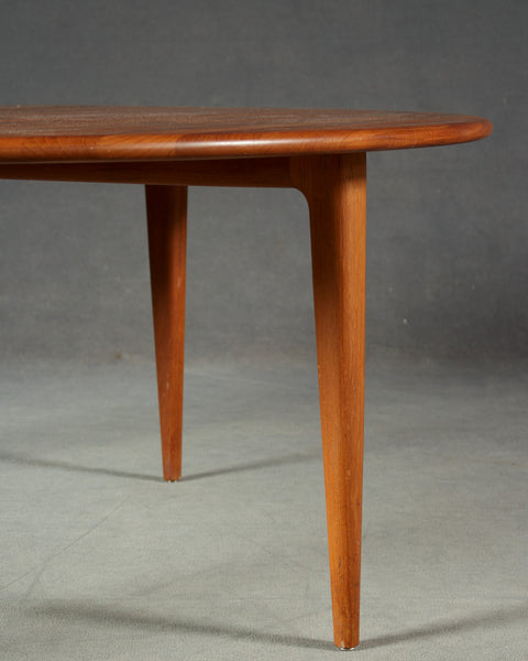 Sideview of Round Solid Teak Coffee Table by A. Mikael Laursen