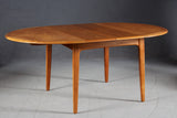 Round Teak Dining Table with Double Butterfly Leaves
