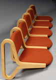 Side View of Beech Wall Hung Chairs with Red Textile Upholstery by Magnus Olesen
