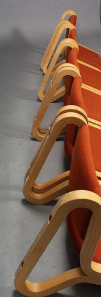 Back Side of Beech Wall Hung Chairs with Red Textile Upholstery by Magnus Olesen