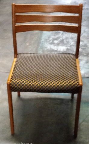 Eight solid teak Danish chair