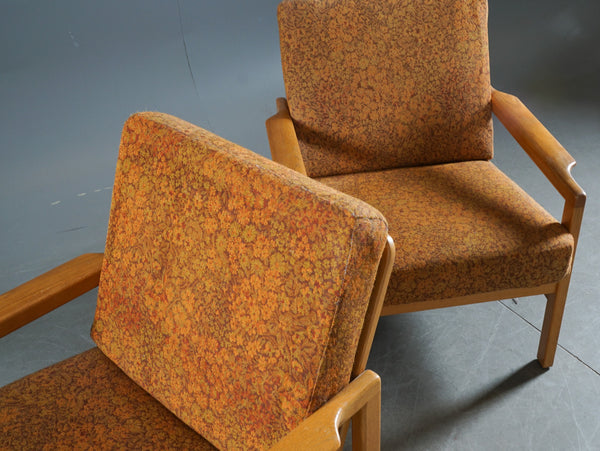 A pair of white European oak armchairs. Probably Erik Chambert