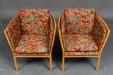 Pair of armchairs with beautifully curved beech frame.