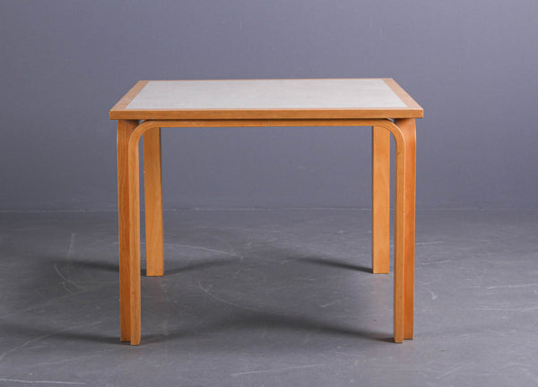 Square beech wood table by Rud Thygesen & Johnny Sørensen.