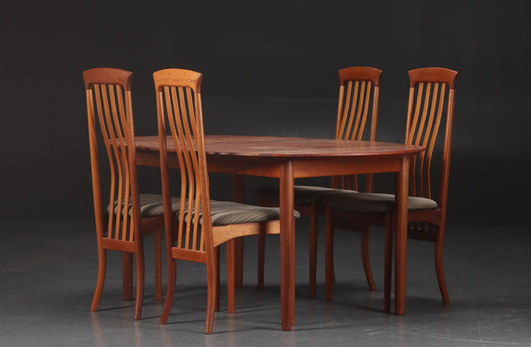 Impressive highback Solid Teak dining chairs by K. Höffer Larsen and Brdr. Andersen.