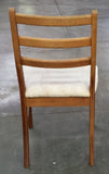 4 solid teak chairs, made in Canada.