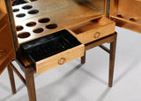 Danish furniture manufacturer. Unique Freestanding bar cabinet, walnut, 1950s
