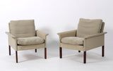 Hans Olsen. Pair of armchairs in light fabric and rosewood