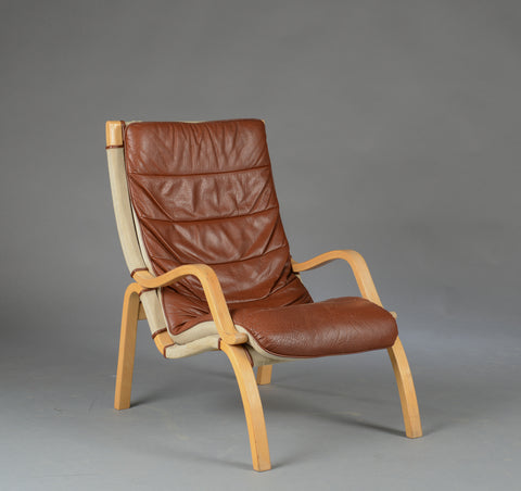 Bent beech canvas and leather armchair