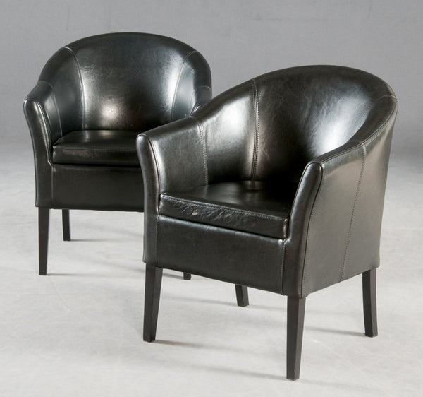 Pair of black lounge chairs