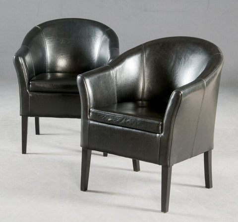 Pair of black lounge chairs