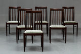H. W. Klein for Bramin Furniture. Dining table chairs in solid lacquered mahogany