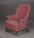 Buttoned armchair