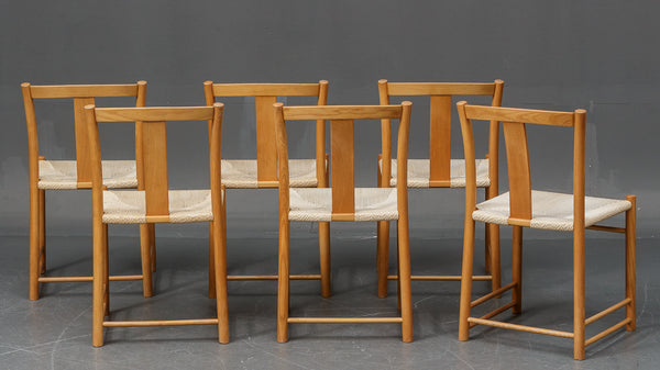 Italian furniture design. Six chairs in beech with wicker