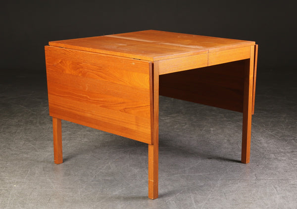 Teak dining table with pull-out, Danish furniture manufacturer