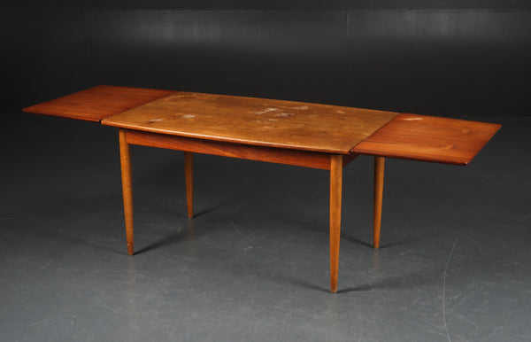 Teak Dining table with 2 concealed leaves