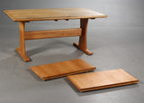 Dyrlund. Dining table with pair of extension leaves, Solid cherry wood.