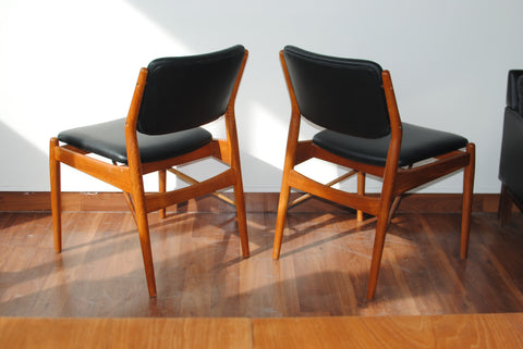 Two Black Leather Teak Frame Dining Chairs by Arne Vodder