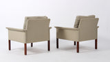 Hans Olsen. Pair of armchairs in light fabric and rosewood