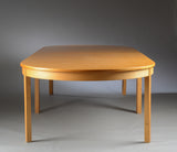 very large 2 part split ash wood dining table with semi-circular ends.