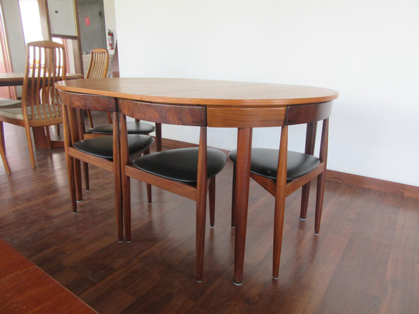 Hans Olsen Teak Table Set with six three legged chairs