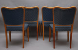 4 elegant Danish dining chairs in cherry.