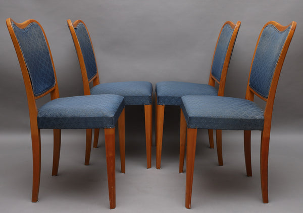 4 elegant Danish dining chairs in cherry.