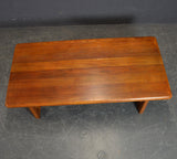 2 inch top solid teak coffee table.